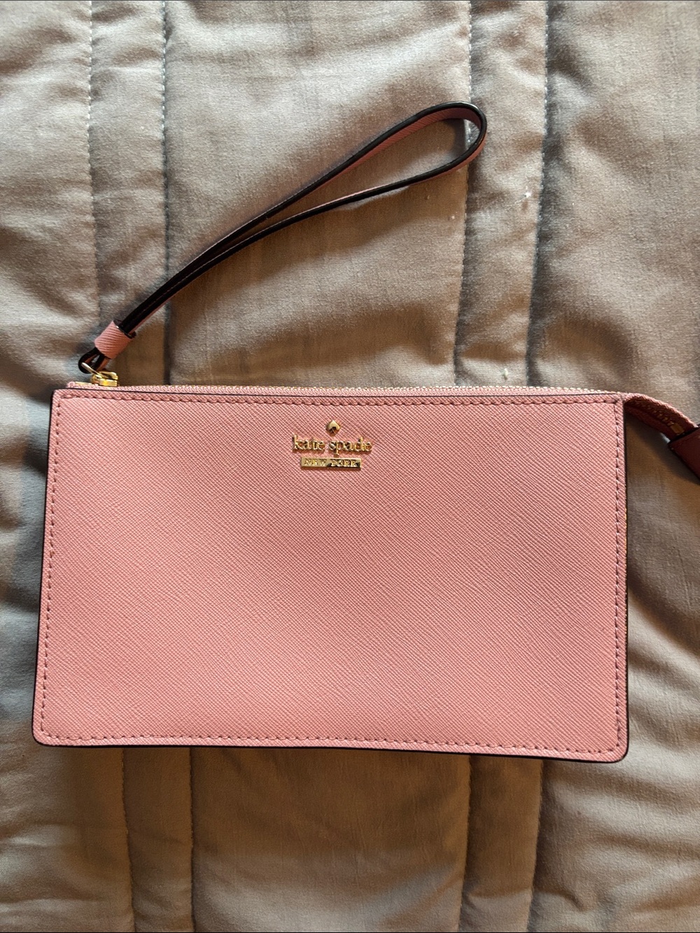 kate spade pink wristlet clutch with gold logo